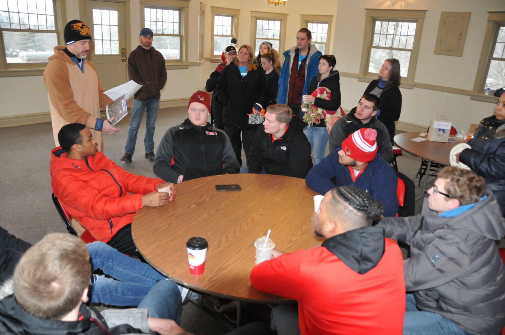 AJ Zimmer instructs the volunteers
